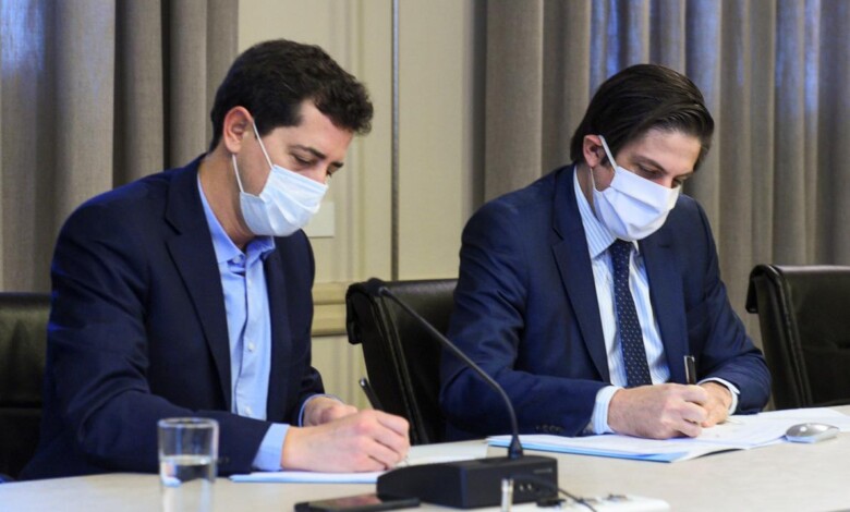 firma de convenio entre Trotta y De Pedro