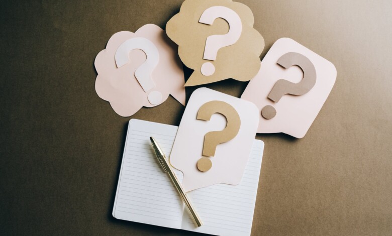 question marks on craft paper
