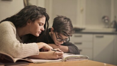 focused students doing homework at home