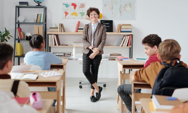 a teacher standing in the classroom