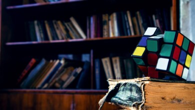 rubik s cube on book