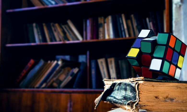 rubik s cube on book