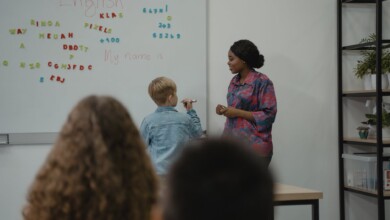 a student standing in front of a class