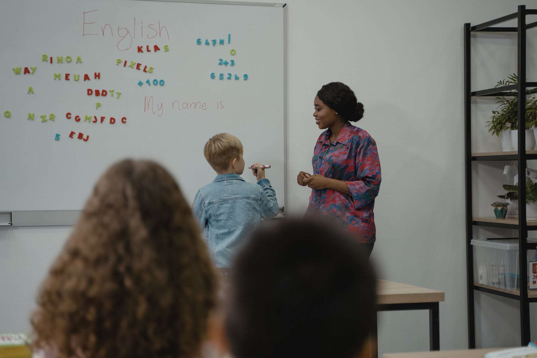 a student standing in front of a class