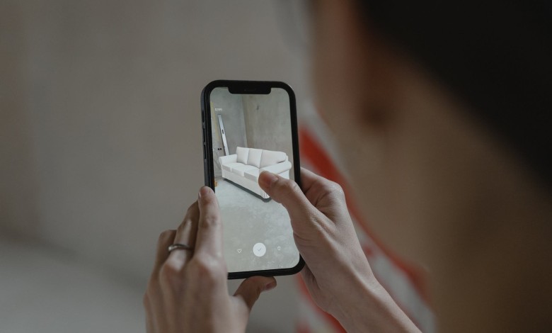 person holding black iphone
