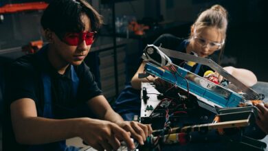 electric engineers working on a machine