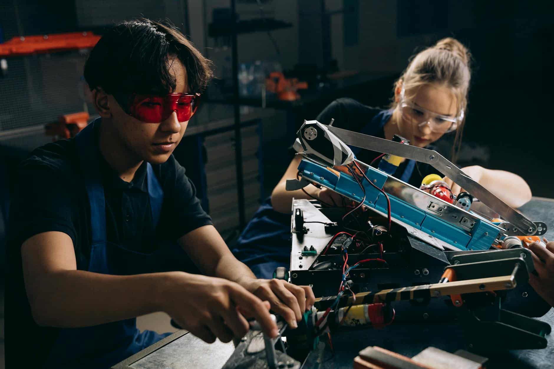 electric engineers working on a machine