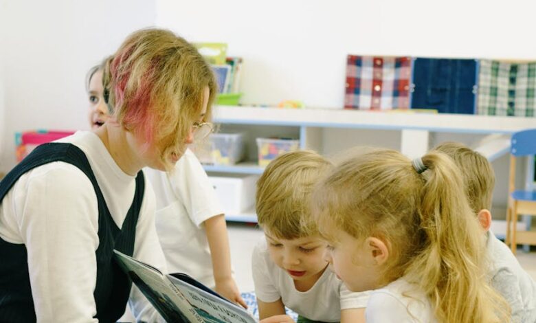 children in the school reading a book with a teacher
