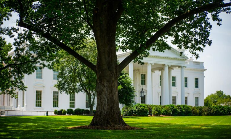 historic white house facade in summer