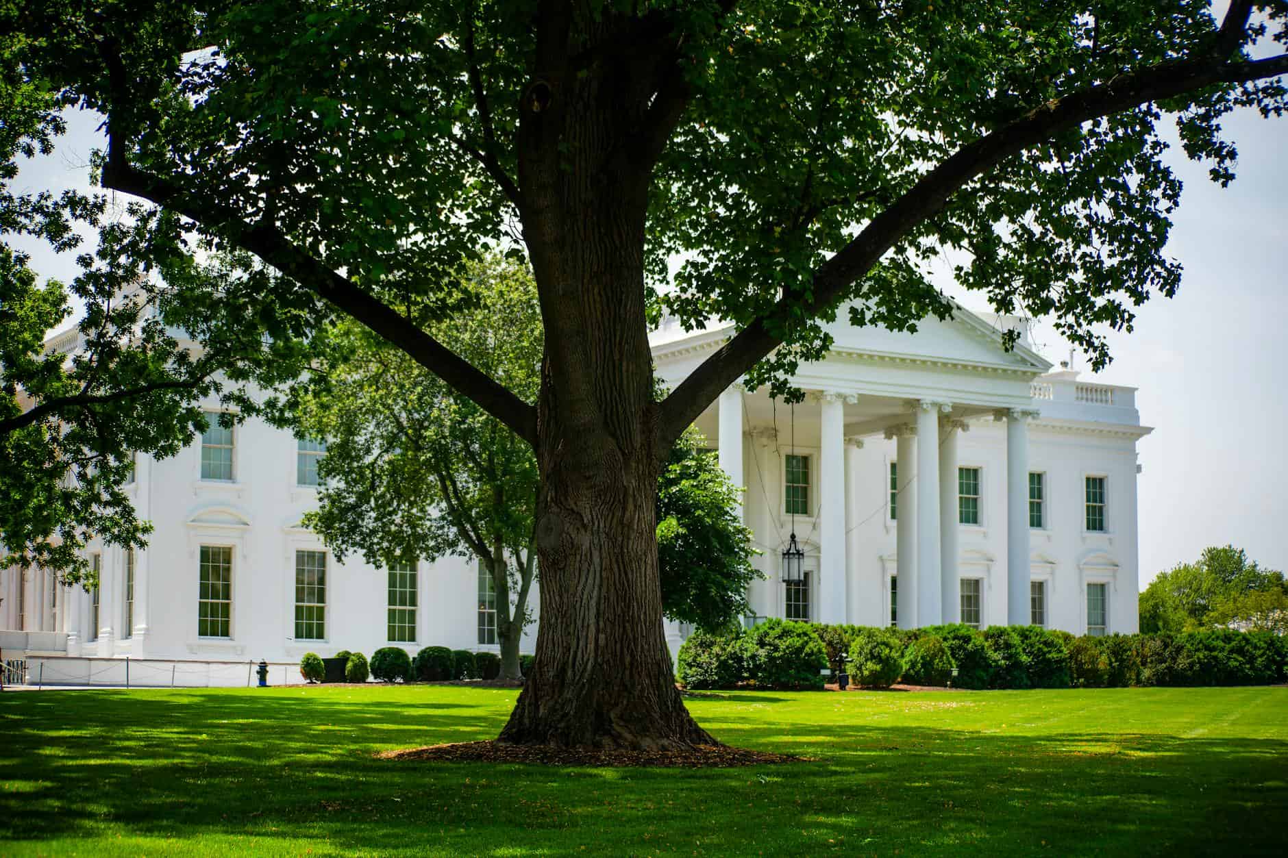 historic white house facade in summer