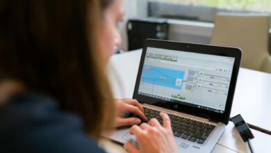female engineer using laptop