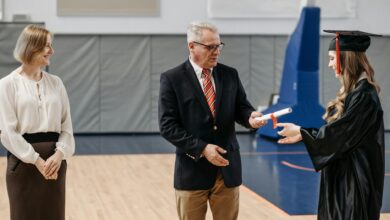 photo of woman receives her diploma