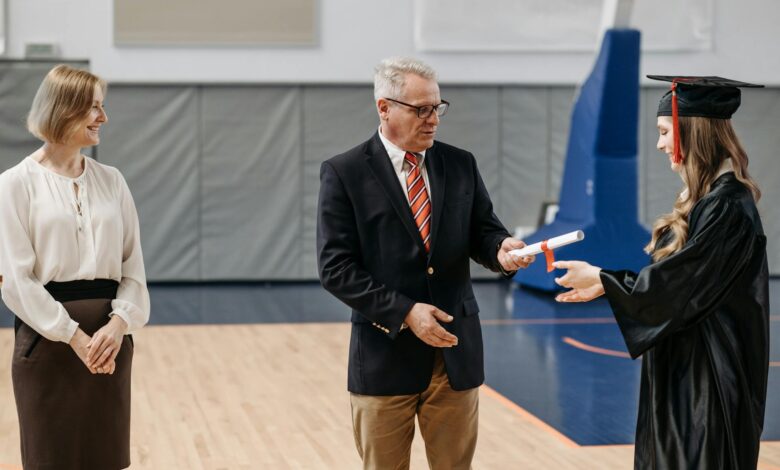 photo of woman receives her diploma