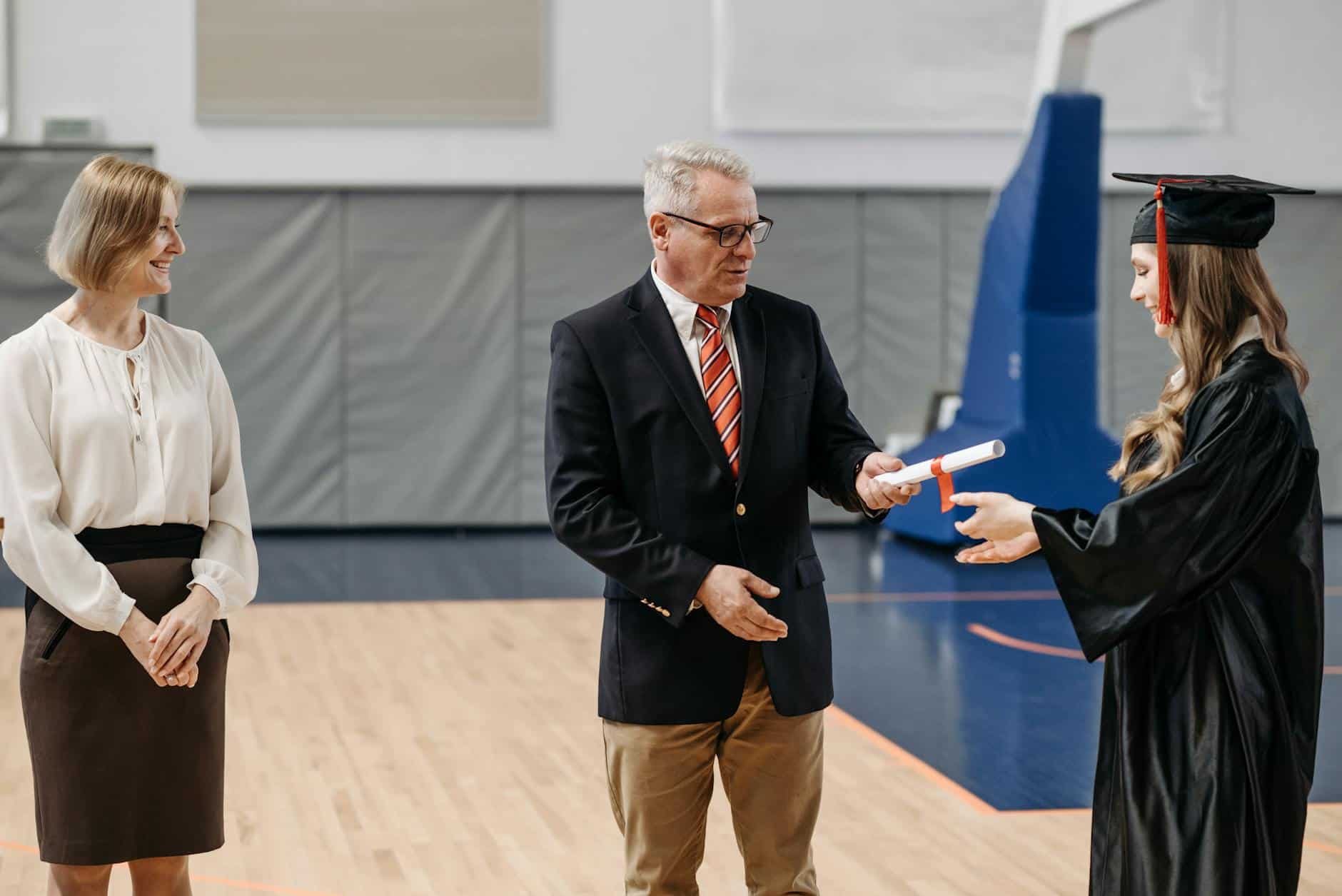 photo of woman receives her diploma