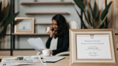 selective focus photo of a diploma on a frame