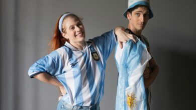 argentinian fans celebrating in flag attire
