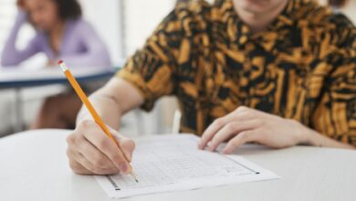 a person holding a pencil