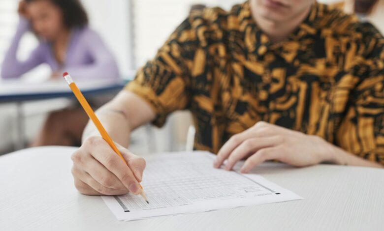 a person holding a pencil