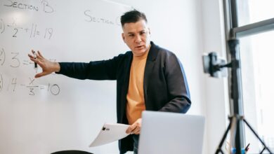 photo of man discussing via smartphone