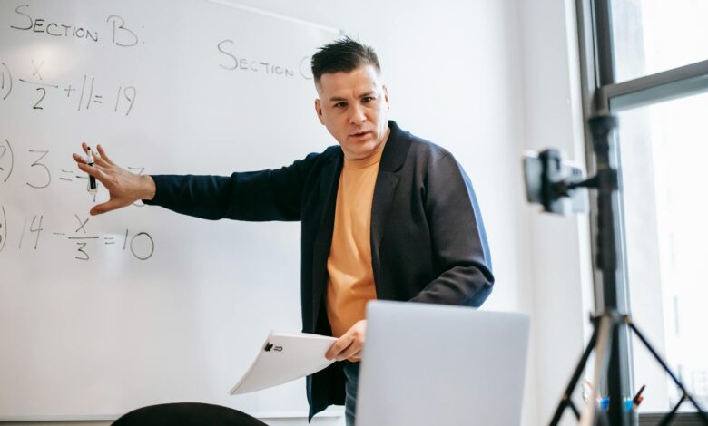 photo of man discussing via smartphone