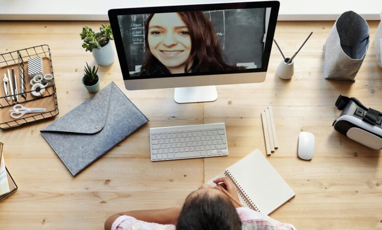 girl watching through imac