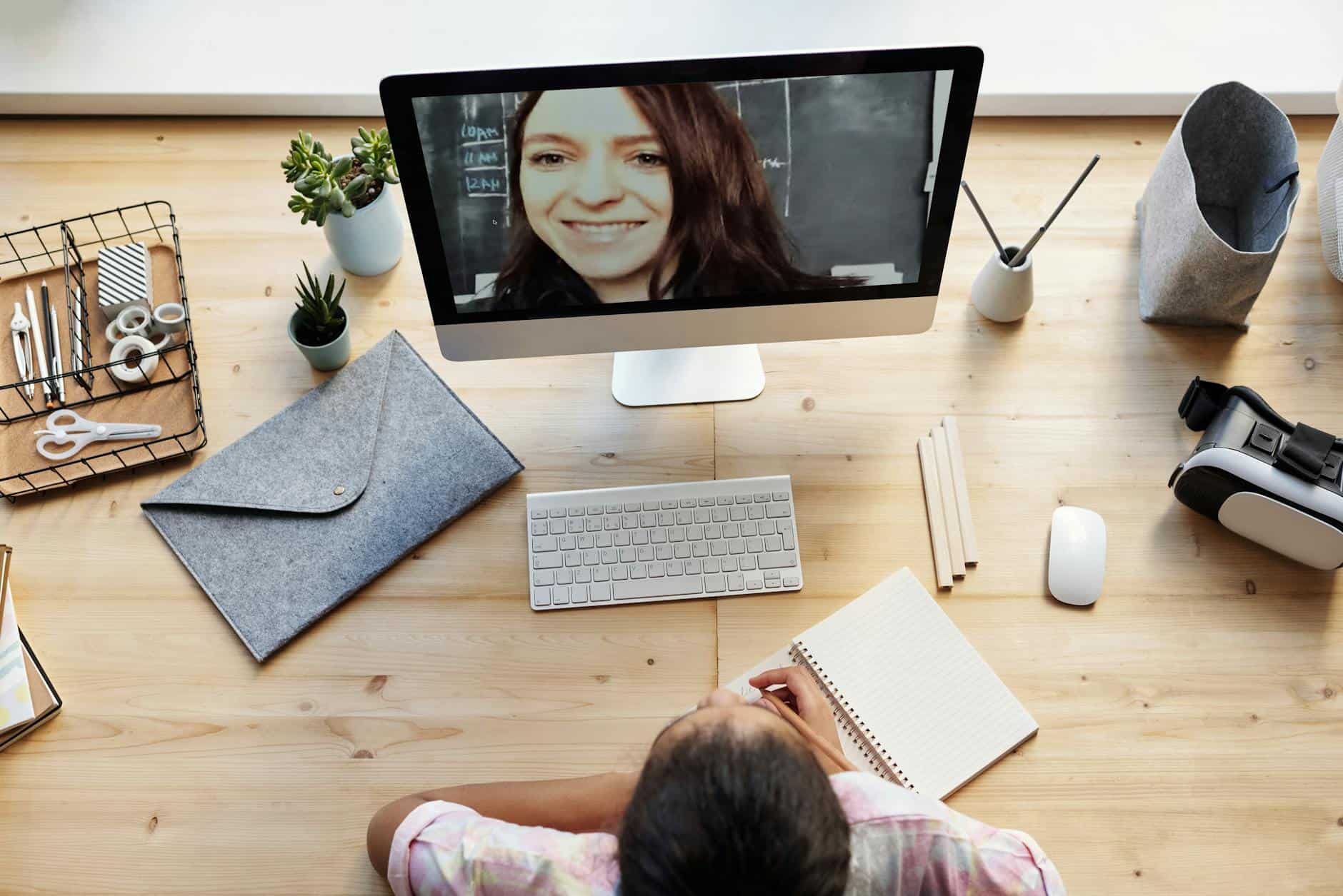 girl watching through imac