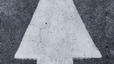 person standing on arrow