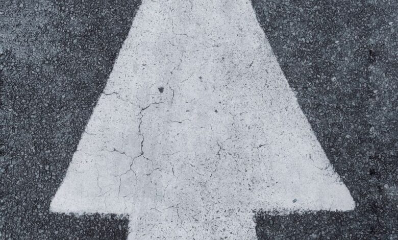 person standing on arrow