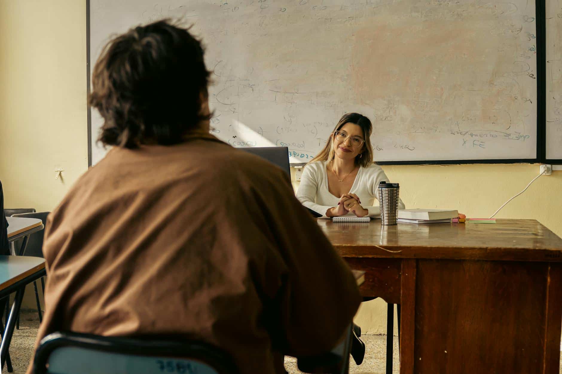 university classroom discussion with teacher