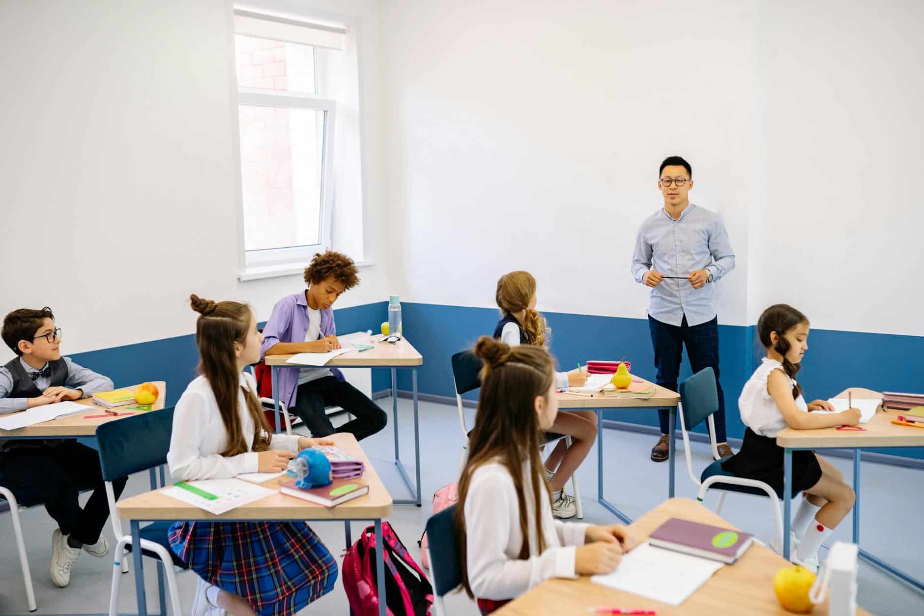 teacher teaching inside the classroom