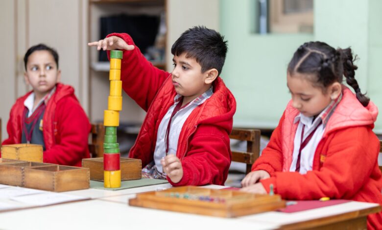young students engaging in montessori activity