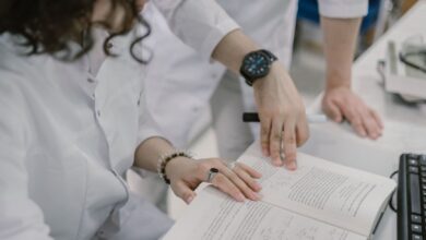 scientists reading a book