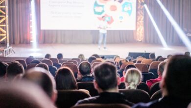 people sitting inside the auditorium