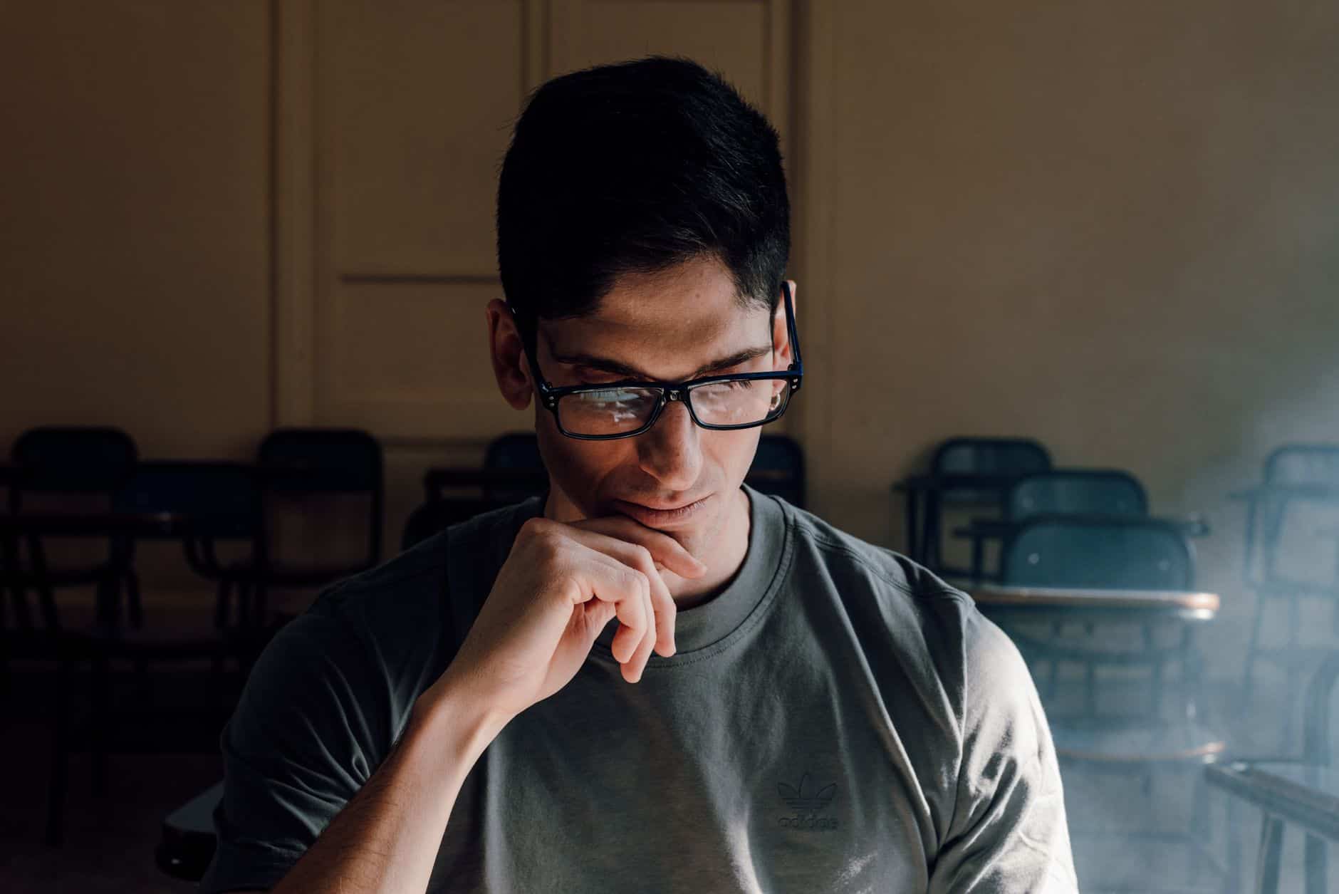 thoughtful student in classroom setting